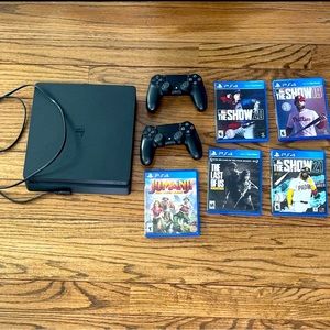 PS4 and all games shown.  Two remote controls and power cord.